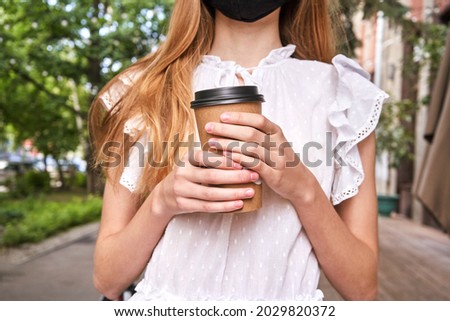 Pretty girl drink beverage outdoors. Buy takeaway coffee in plastic cup. Caucasian real people. Single female person. Staycation concept. Positive attractive human. No Sustainable lifestyle
