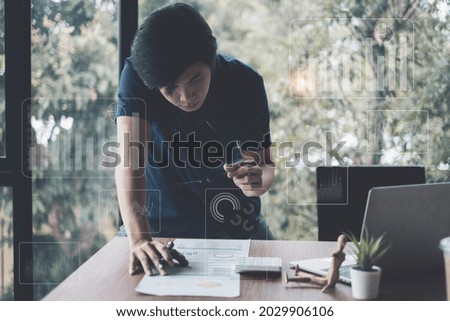 Businessman analyzing a business analytic and intelligence