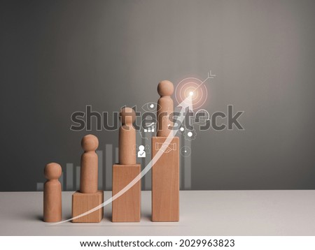 Leadership with business strategy and key to success concept. The wooden figure, leader with influence and empowerment standing on a growth graph chart with team and business management vision icons.