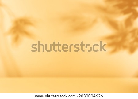 Autumn background with shadow of the maple tree leaves on a wall. Abstract Autumnal scene. Royalty-Free Stock Photo #2030004626