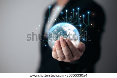 Global network connection. Concept of digital business big data connection. Businessmen hold virtual worlds. Elements of this image furnished by NASA