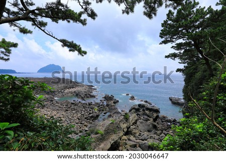 It is a beautiful summer landscape of the coast of Jeju Island.