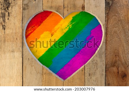 Love Valentines heart wooden frame from recycled old palette with pride rainbow colours  background, copy space