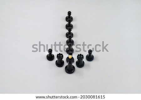 Different angles on the direction of business development, teamwork, leadership, chess pieces on a white background. 