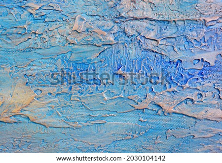 Beautiful textured background in blue, a fragment of an abstract painting.