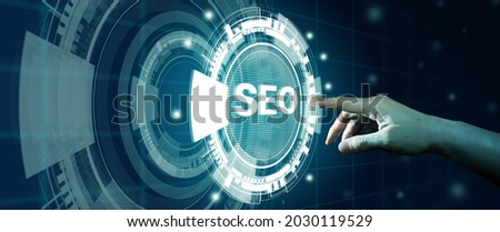 SEO Search Engine Optimization. Man finger touching SEO Hologram. Digital online marketing, Digital marketing media, and Internet technology Concept.