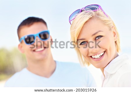 A picture of a woman spending time with her boyfriend at the beach
