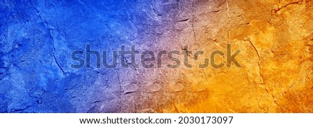Blue orange yellow abstract background. Toned rock texture background with copy space for design. Wide banner. Bright, vibrant, beautiful, colorful, beauty, fashion. Ice fire.