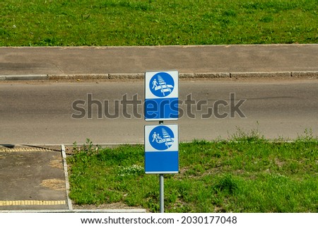 Signs for pedestrians and people with disabilities with escort. Road signs of the transition of railways and roads.