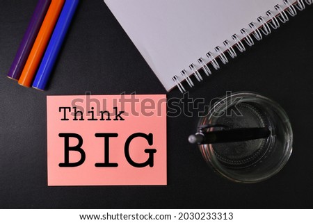 Marketing and Communications Concept. Think Big text words typography, business motivational inspirational concept. Inspire Think Big Creativity Concept. High angle view