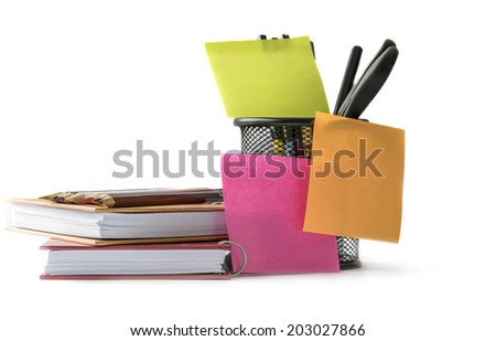 Sticky note and office supplies isolated on white background