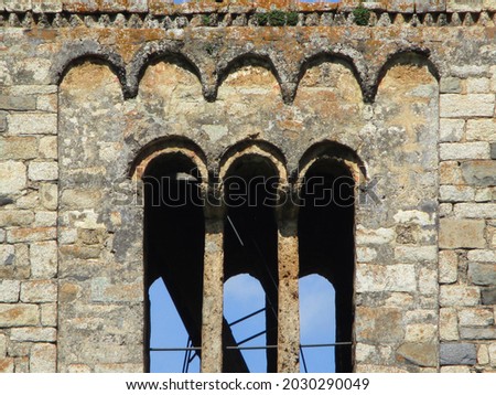 UNESCO World Heritage.
First Romanesque church of Santa Maria in the village of Taüll. (12 century). Detail of the bell tower decoration. Valley of Boi. Spain.                                