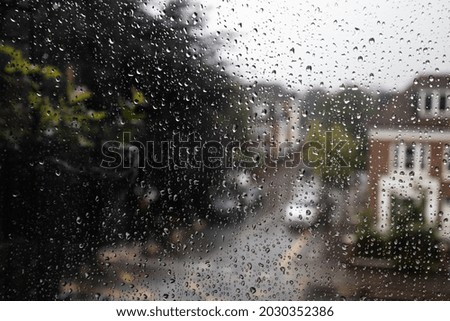 Rain drops against window close up