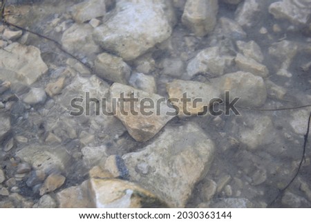 some rocks in the lake on Turin, rome.