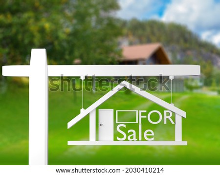 White for sale sign. House for sale. Sign for sale of cottage. country house is blurred. Real estate market metaphor. Concept - buying house with mortgage. Real estate mortgage.