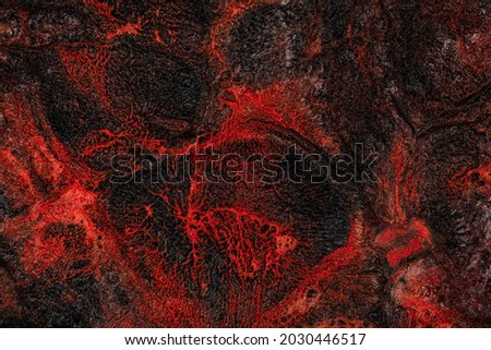 Fluid art. Abstract background with mixing paint effect. Liquid texture that flows and forms lines color. Mixed paints for wall art or design poster. Backdrop similar to the landscape of movement lava
