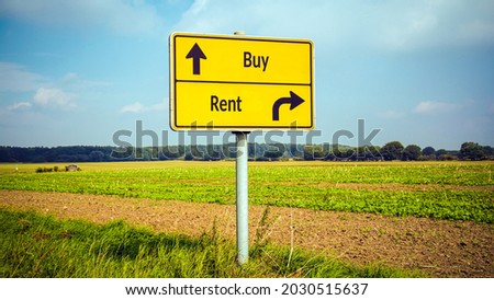 Street Sign the Direction Way to Buy versus Rent