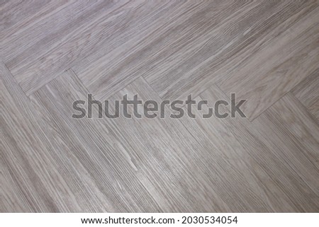 wood pattern tile flooring in the building