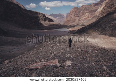 Chimtarga pass and Mutnyi lake under the highest peak of Fann mountains, Chimtarga, Tajikistan