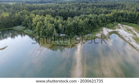 Aerial view of the beach and the mediterranean sea, beautiful clear sea water on a warm sunny day. The concept of rest in a warm country. High quality photo