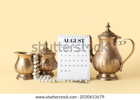 Composition for Islamic New Year on color background Royalty-Free Stock Photo #2030653679
