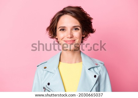 Photo of optimistic nice brunette lady wear jacket isolated on pastel pink color background