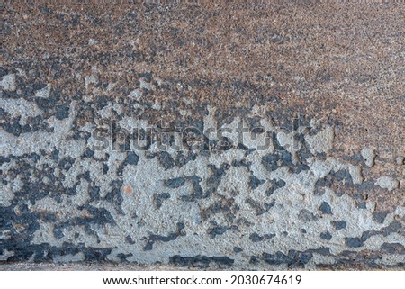 Back background of old plaster in the form of fur coats with different defects and spoiled texture.