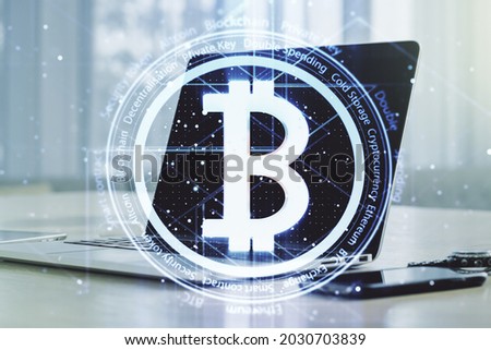 Creative Bitcoin concept with modern laptop background. Multiexposure
