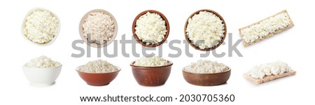Bowls and crispbread with cottage cheese on white background Royalty-Free Stock Photo #2030705360