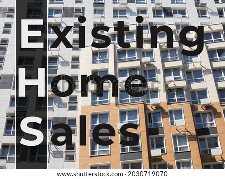 Text Existing Home Sales on new house background. Financial Market Concept Royalty-Free Stock Photo #2030719070