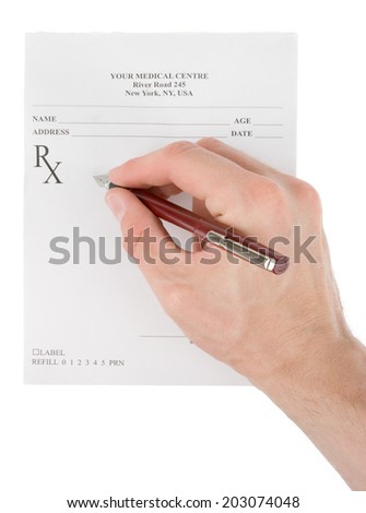 Doctor filling in empty medical prescription