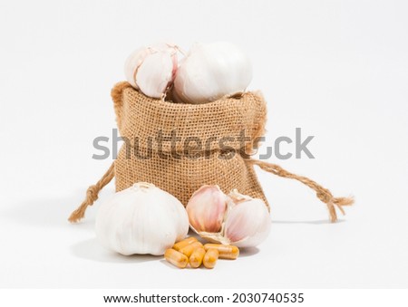 Garlic is antiviral and is a cold and flu remedy. Picture of spicy seasoning ingredients, head of garlic 