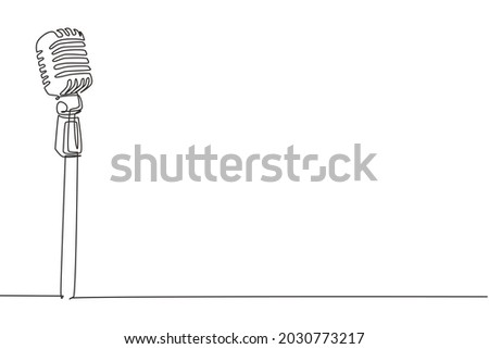 Single one line drawing vintage retro stage microphone. Old technology stand microphone concept for comedian at standup comedy show. Modern continuous line draw design graphic vector illustration
