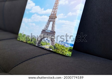 Photo canvas print stretched on frame with gallery wrap, photography with Eiffel Tower, photo printed on canvas on sofa