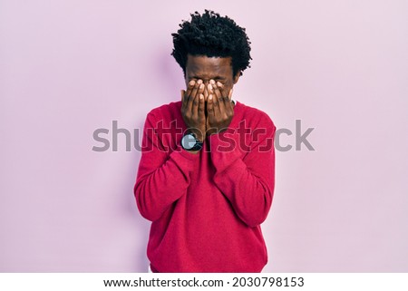 Young african american man wearing casual clothes rubbing eyes for fatigue and headache, sleepy and tired expression. vision problem 