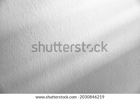 Natural Light and shadow from window overlay effect on white  concrete texture background.  