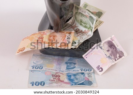 Turkish coins marble object with a composition in front of and on the bull 100 TL 50 TL 20 TL 5 TL different alternative compositions angles macro detail shooting money finance economy buying. 