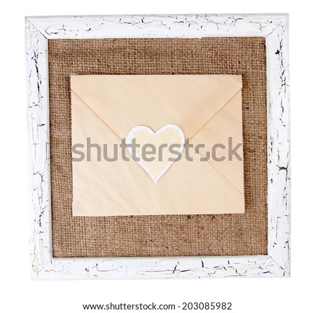 Wooden frame with love letter isolated on white