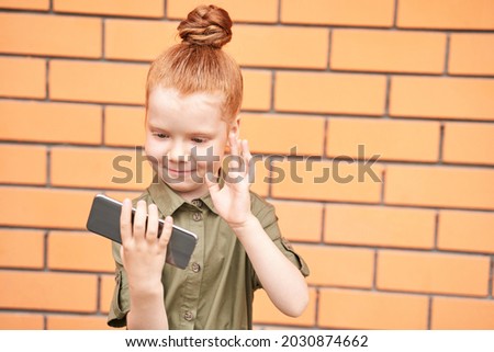 Pretty face. Cute school child taking selfie. Active vacation. Small people. Online video call. Happy children concept. Lifestyle action. Wathing school lesson