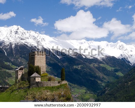 Scenic view of castle Laudeck with snowcapped mountains in the background