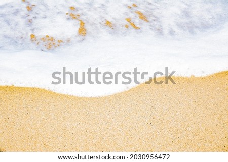 surf water on the beach where the waves end