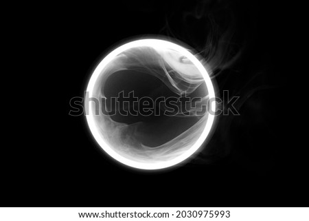 Futuristic smoke. Neon color geometric circle on a dark background. Round mystical portal.