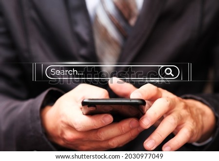 Business hand using smartphone with data search technology Search engine Optimization, Searching for information