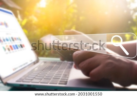 Hand man using laptop and Searching browsing data on the Internet online.network,media, keyword,Digital Web,Photo concept Searching information of and Technology.