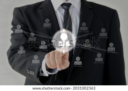 Business man touching human pictogram with scoping sign