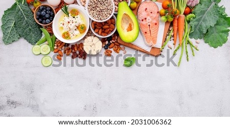 Ketogenic low carbs diet concept. Ingredients for healthy foods selection set up on white concrete background. Royalty-Free Stock Photo #2031006362
