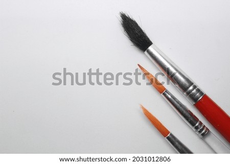 watercolor brush with plain pastel color background
