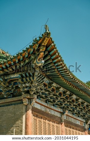 The detail view of the wooden roof of ancient Chinese architecture in Dafo temple, Zhangye, China.