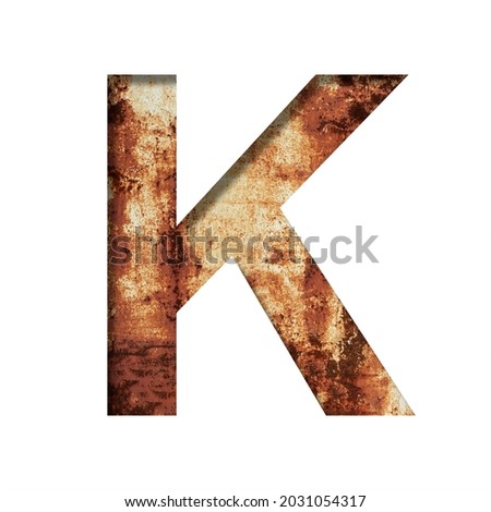Rusty iron letters. The letter K cut out of paper on the background of an old rusty iron sheet with rust stains and cracks. Decorative alphabet, font collection.