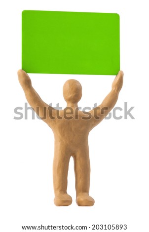 Plasticine man holding a card.